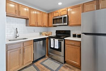 Kitchen with wood cabinets and stainless appliances